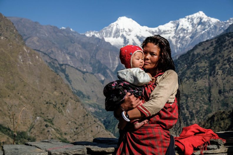 A mother and her child, beautiful Ganesh Himal in Nepal